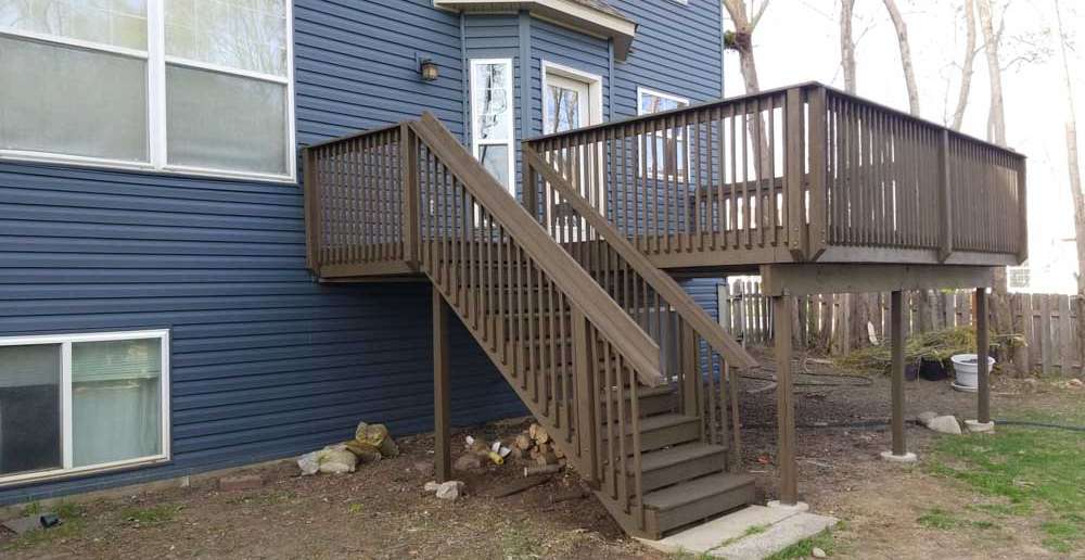 Side of home with deck